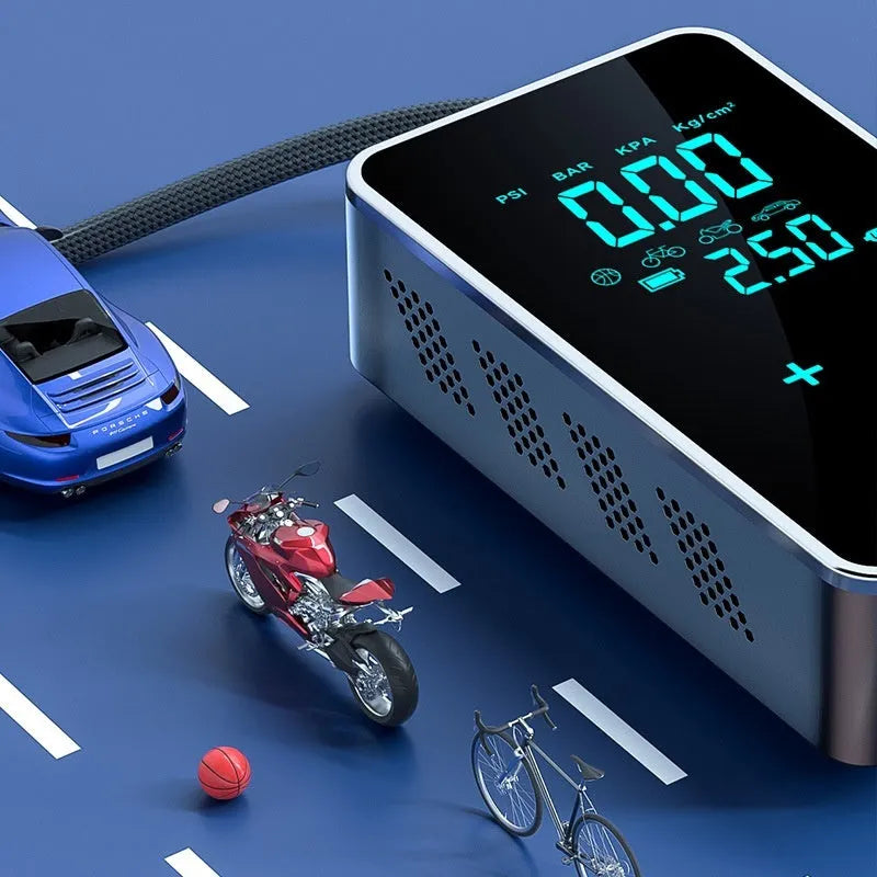 Black wireless portable tyre inflator with LCD screen, attached air hose, and set of four nozzle adapters
