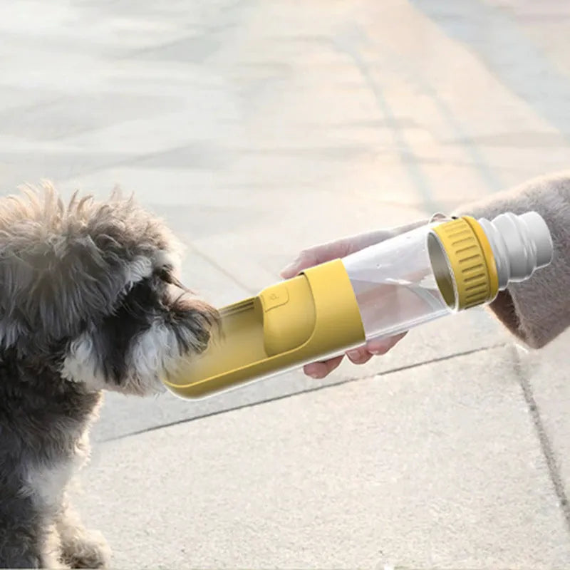 Portable dog water bottle with integrated drinking bowl showing dark blue colour option