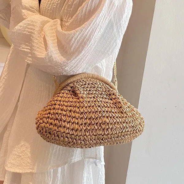 Khaki straw beach handbag with chain detail and crossbody shoulder strap