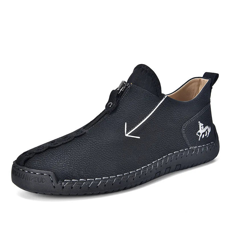 Men's black front-zipper casual leather-style boots with round toe and hand-stitched detail on a white background.