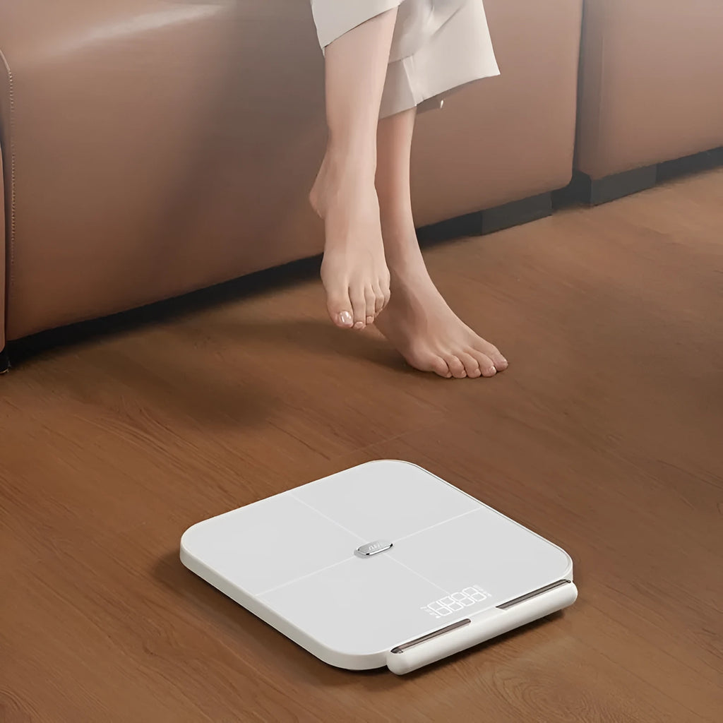 White professional 8-electrode body fat scale with tempered glass platform and LED display.