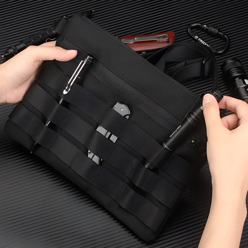 Black oxford cloth portable outdoor kit measuring 18cm by 3.5cm