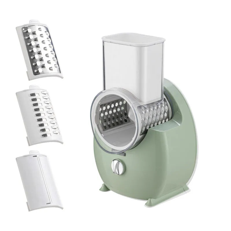 White electric vegetable slicer with rotary grater, feeding port, and three blade pairs on kitchen counter