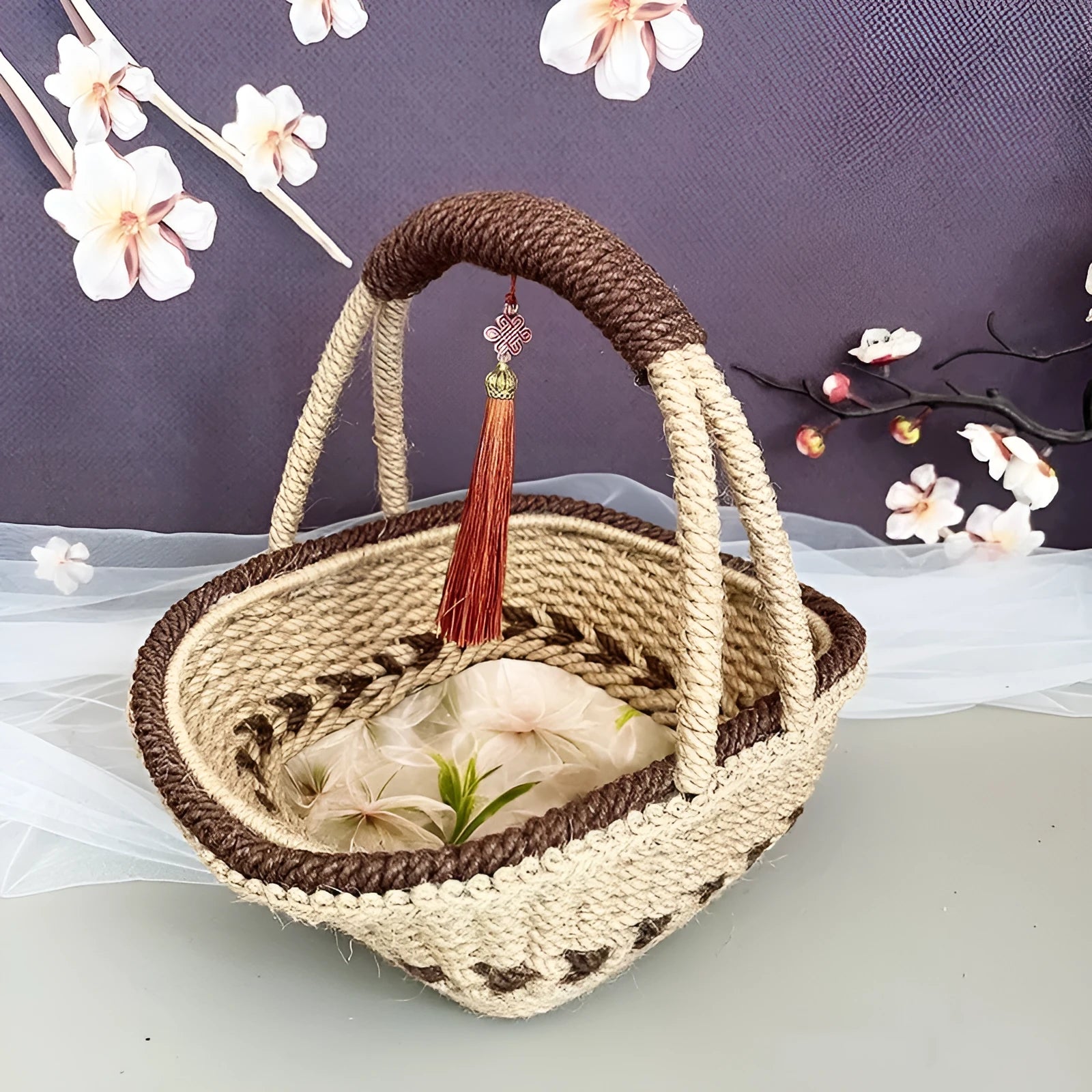 Hand-woven straw basket with hemp rope finish in coffee brown colour