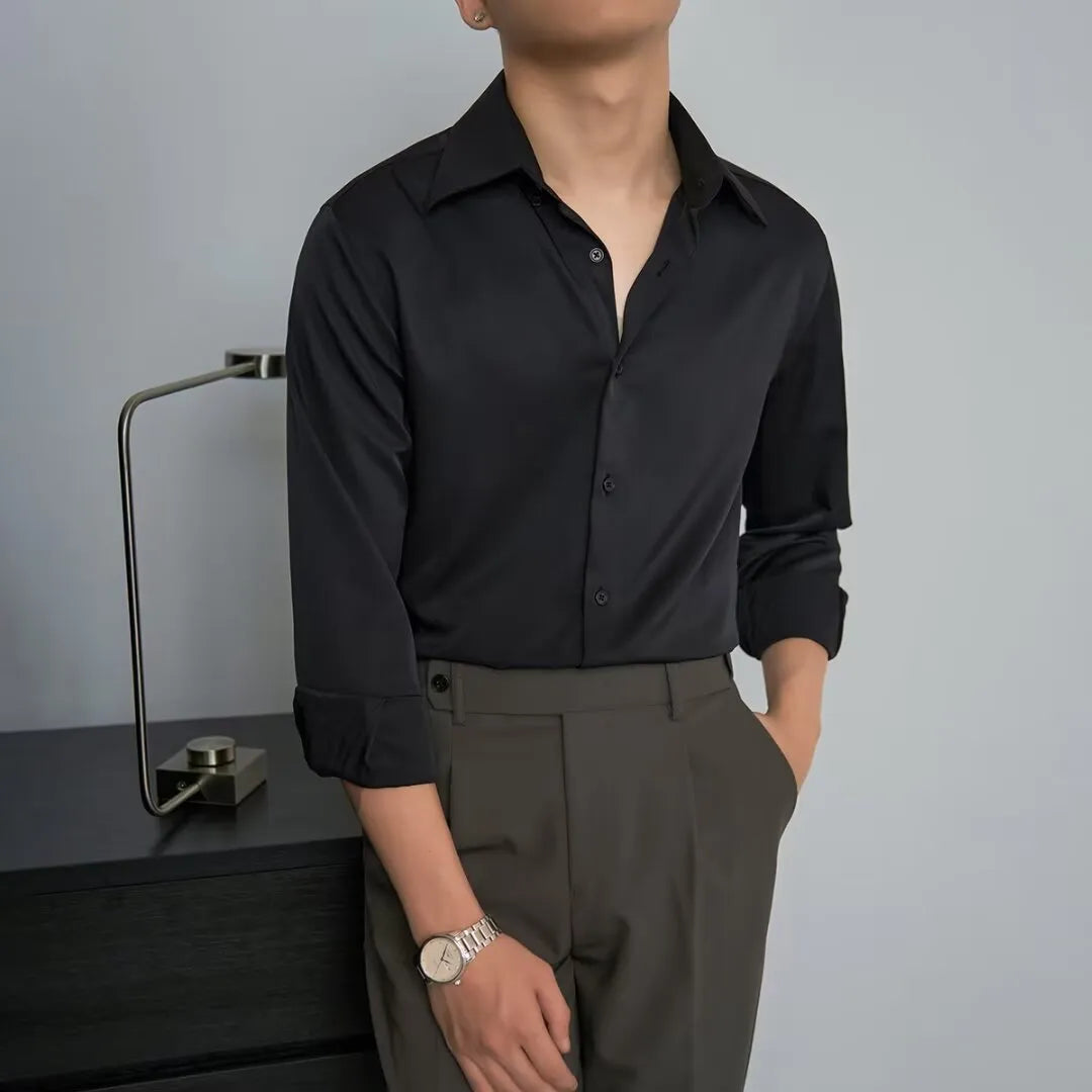 Black men's long sleeve cardigan shirt in slim Korean cut with Japanese retro style details on a model.