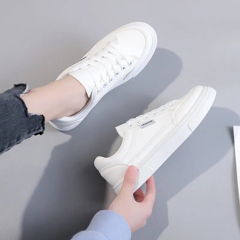 Women's low-top Korean style sneakers in white or brown artificial PU leather with plastic sole