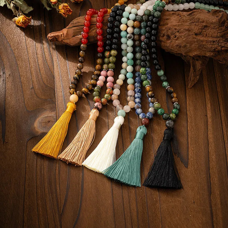 Retro style long beaded necklace and matching bracelet set in geometric round beads.
