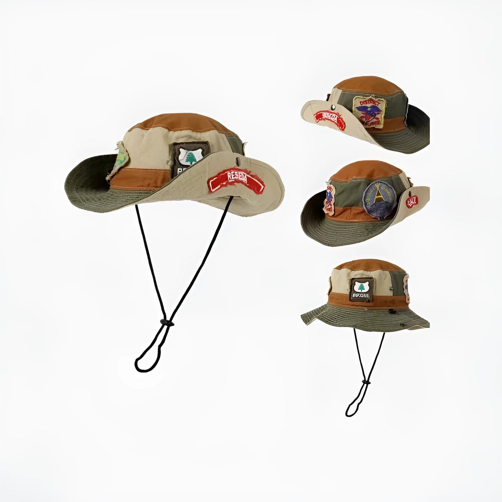 Army green cotton fisherman hat with patchwork detail and flat top crown on a neutral background.