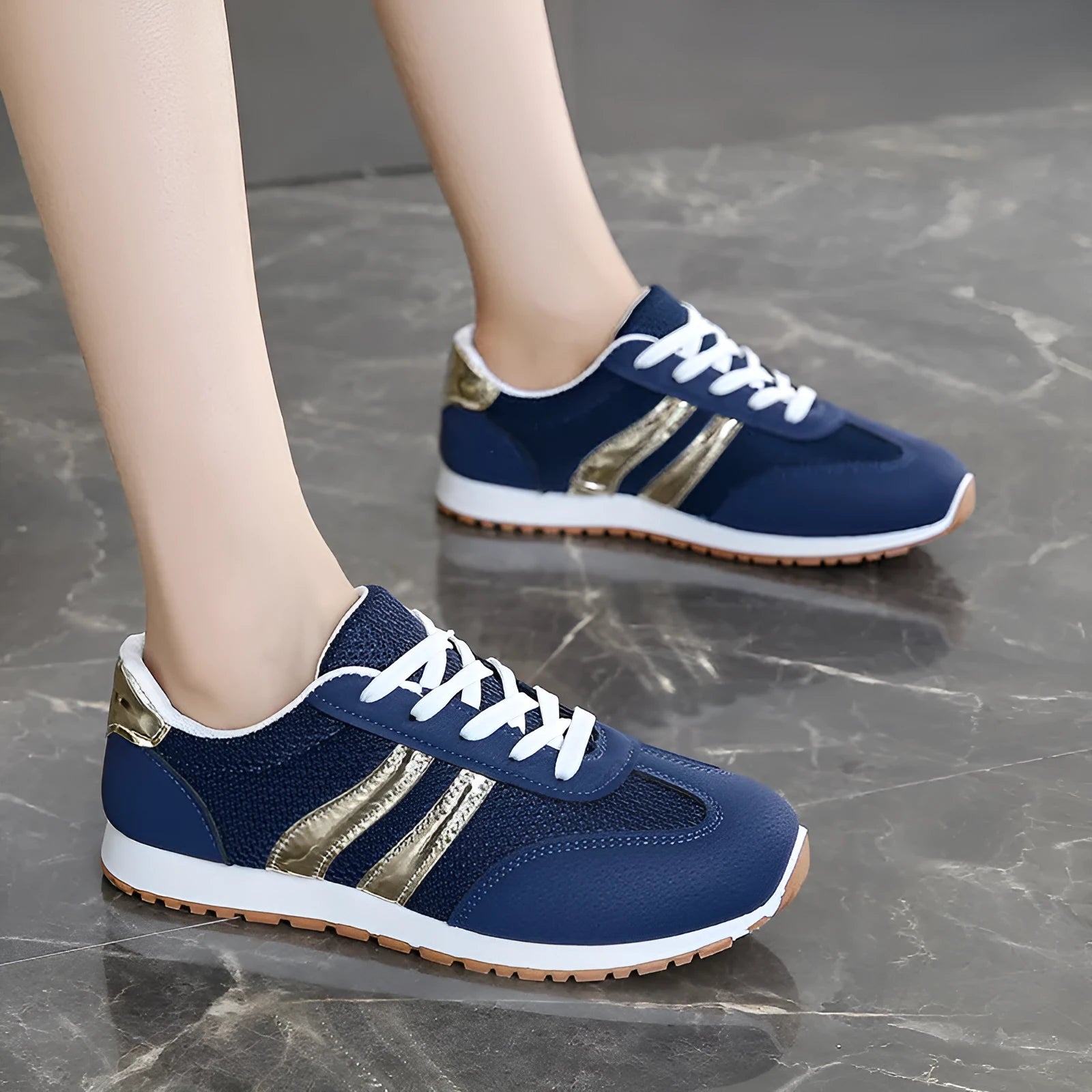 Blue women's casual sports shoes with cross shoulder straps and a round toe.