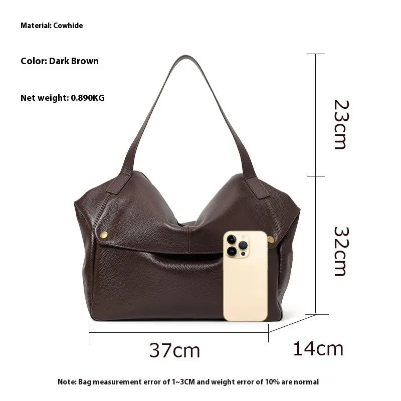 Brown genuine leather women's shoulder bag with a horizontal square shape and shoulder strap.