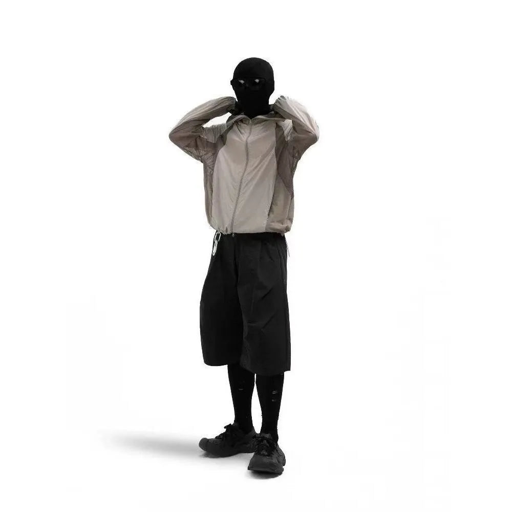 Sun protective clothing with mesh stitching in desert brown colour showing regular length design