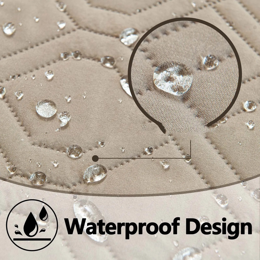 Reversible waterproof dog sofa cushion in dark grey and light grey contrast colours on a sofa.