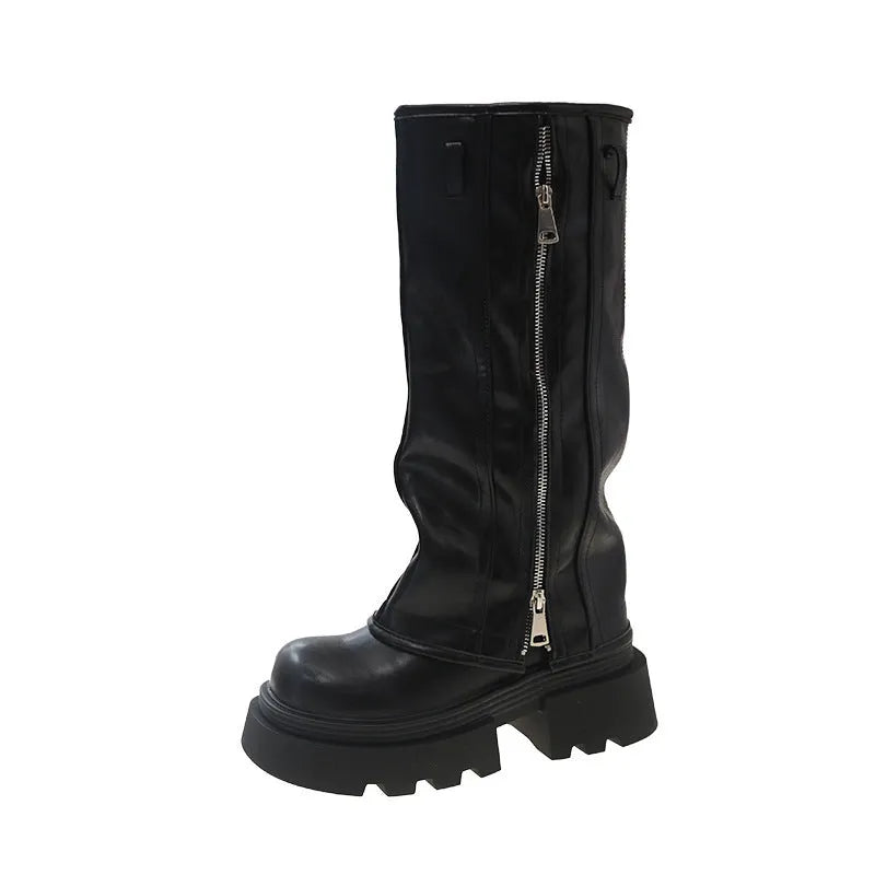 Women's platform muffin pants Martin boots in black with a high ankle top and square rubber heel.