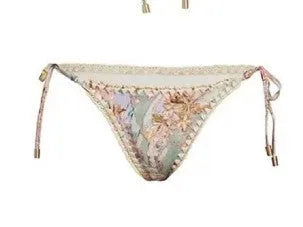 Women's floral print bikini set with matching skirt in creamy-white beige colour