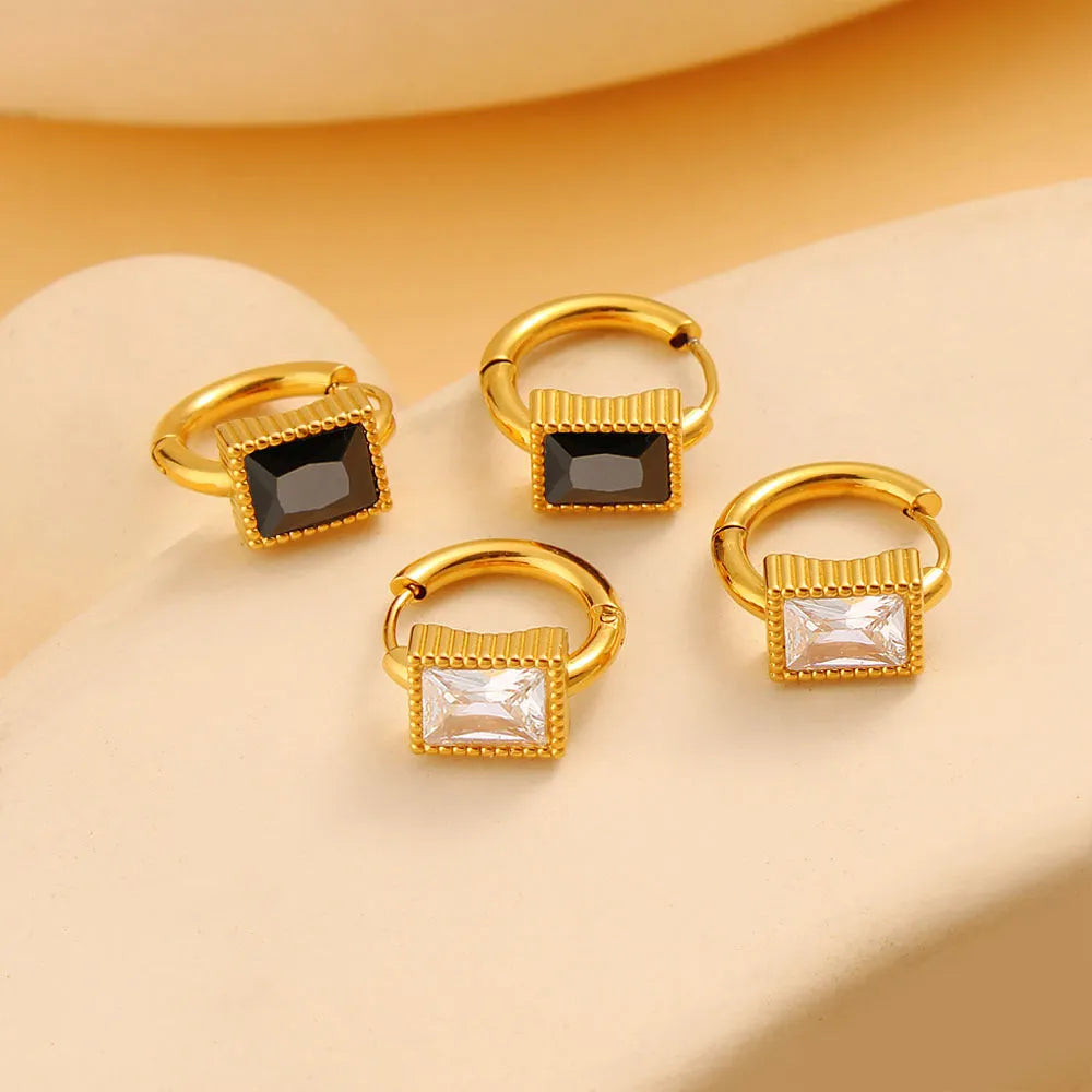 Women's stainless steel earrings with geometric square zircon design in white, black, and green colour options