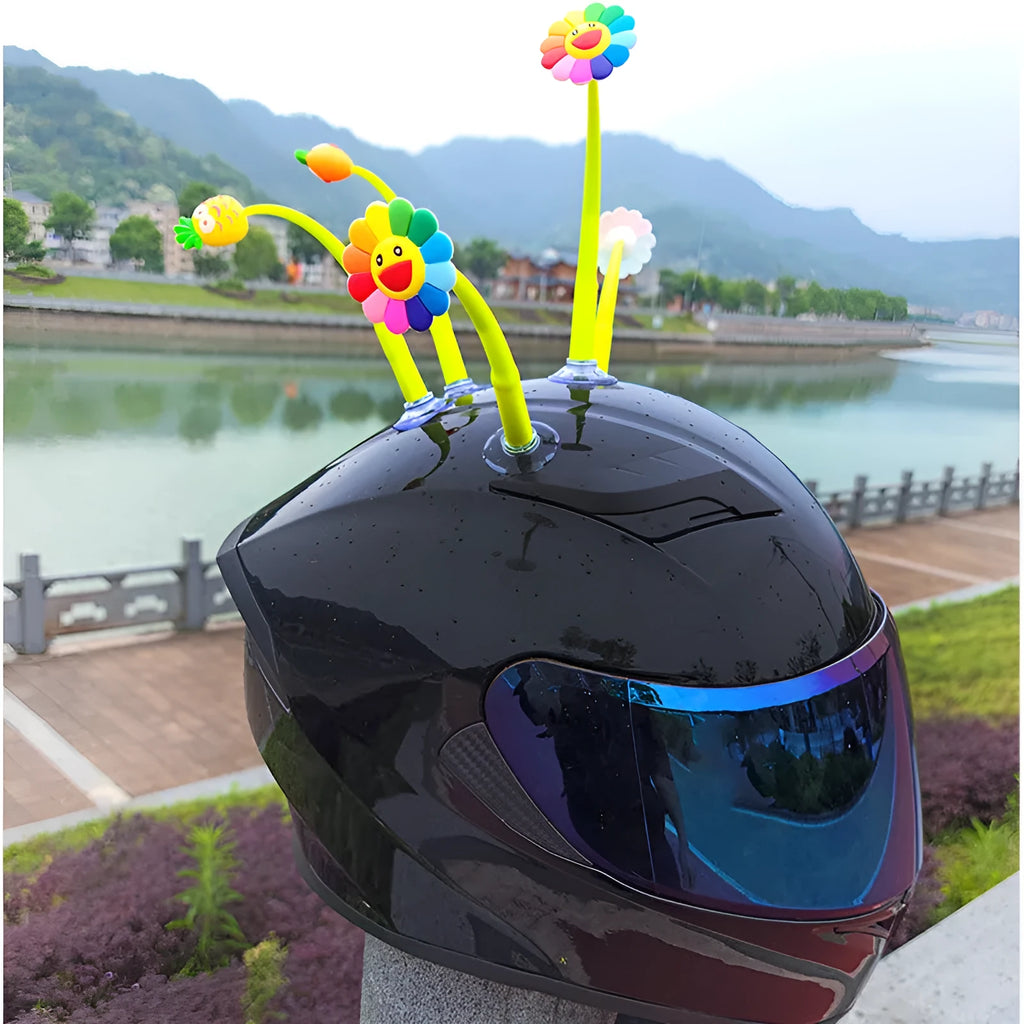 Silicone swinging sunflower decoration with suction cup for motorcycle and bicycle helmets.