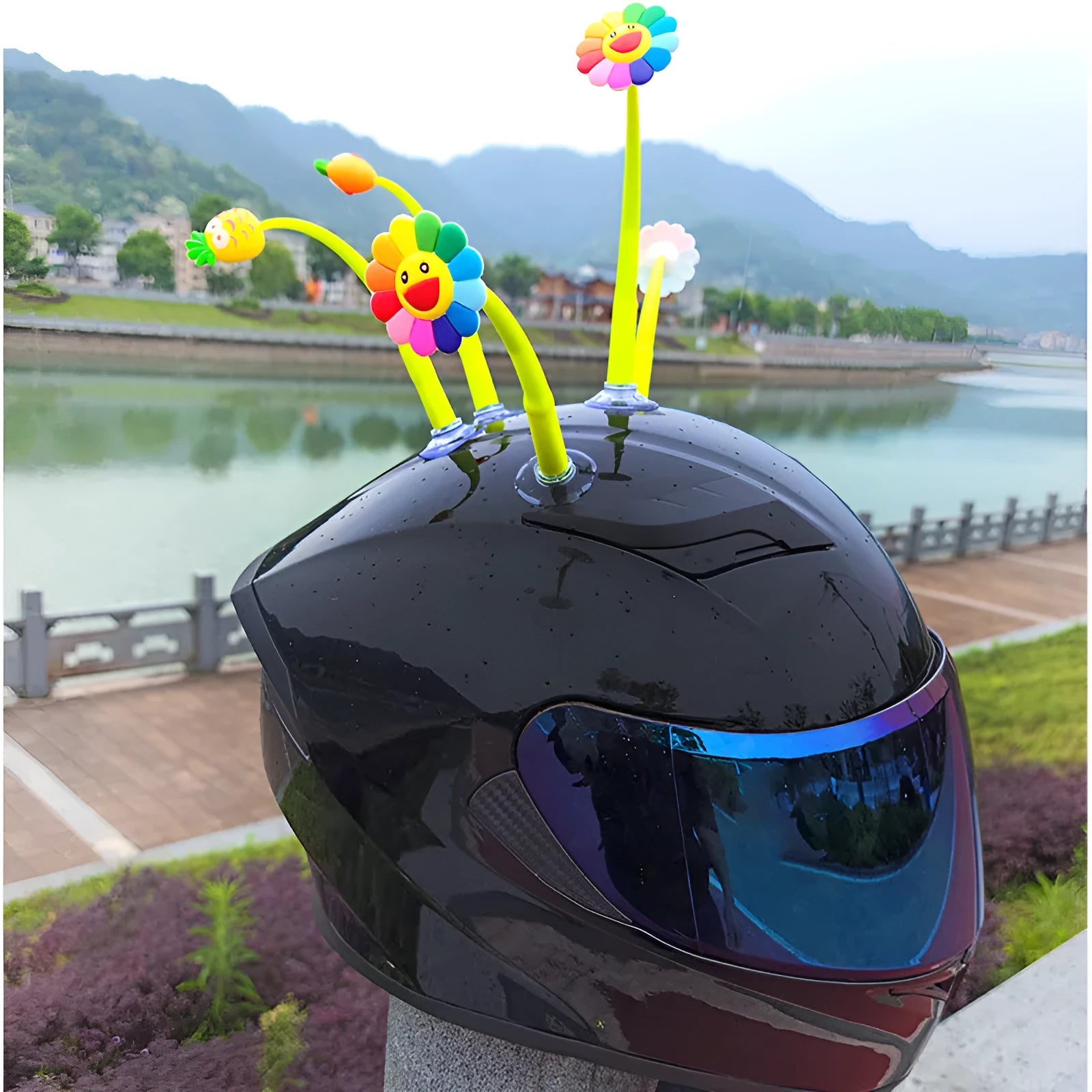 Silicone swinging sunflower decoration with suction cup for motorcycle and bicycle helmets.