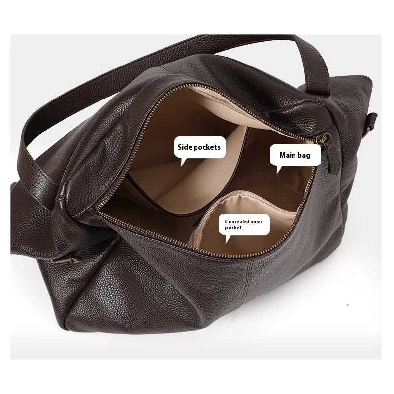 Brown genuine leather women's shoulder bag with a horizontal square shape and shoulder strap.