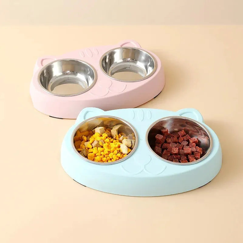 Blue macaron-shaped plastic pet feeding tray with two bowls and non-slip rubber feet