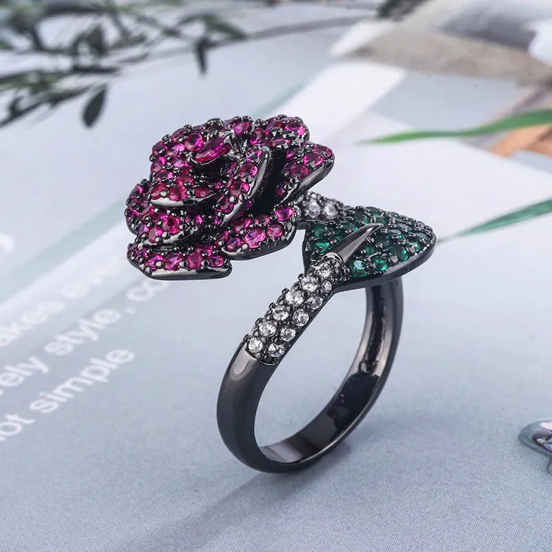 Black gold geometric ring with red corundum stones, female fashion jewellery