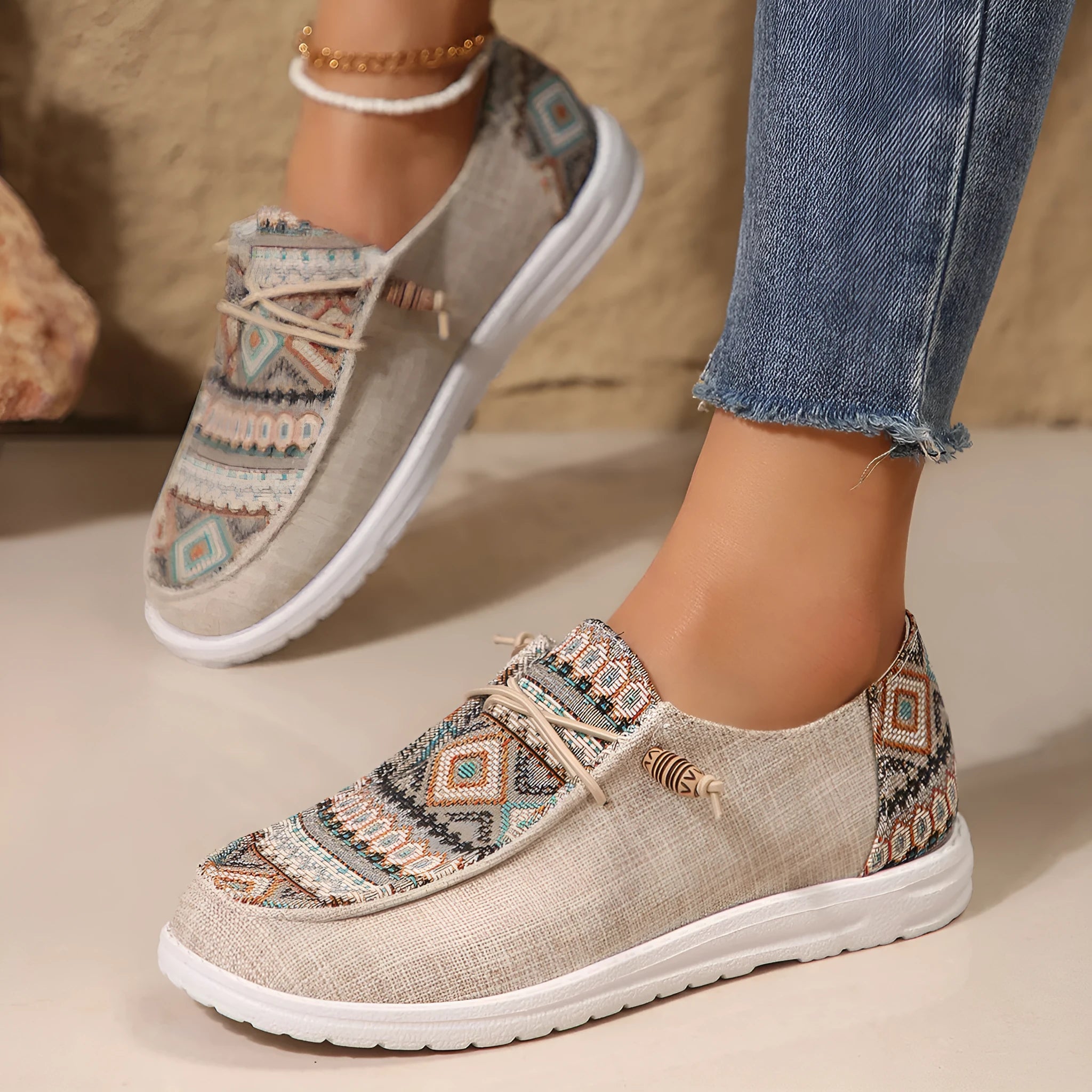 Women's flat slip-on shoes in black, dark grey, and khaki with round toe and rubber sole.