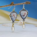 Women's lavender turquoise and white pearl drop earrings with geometric retro design.