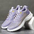 Women's lavender purple Flyknit running shoes with mesh lining and EVA sole on a white background.
