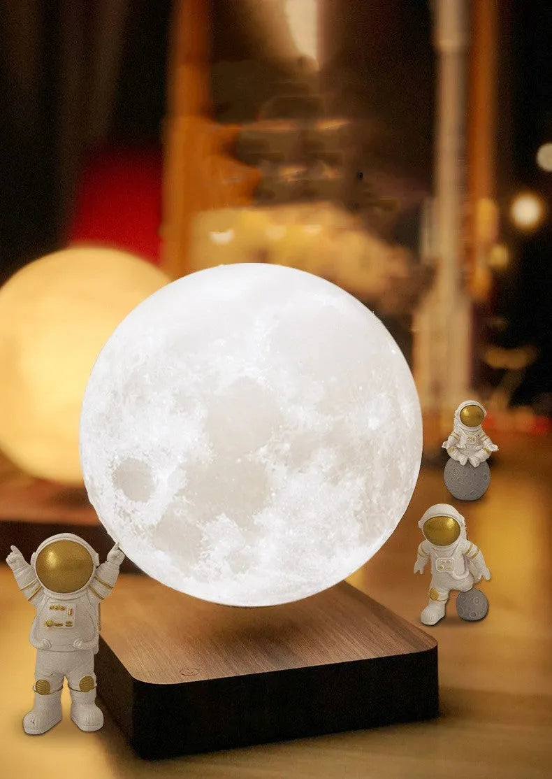 Maglev floating moon planet night light with astronaut figurines and LED illumination