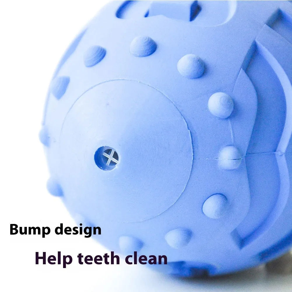 Light green rugby ball shaped dog chew toy with textured rubber surface for interactive play