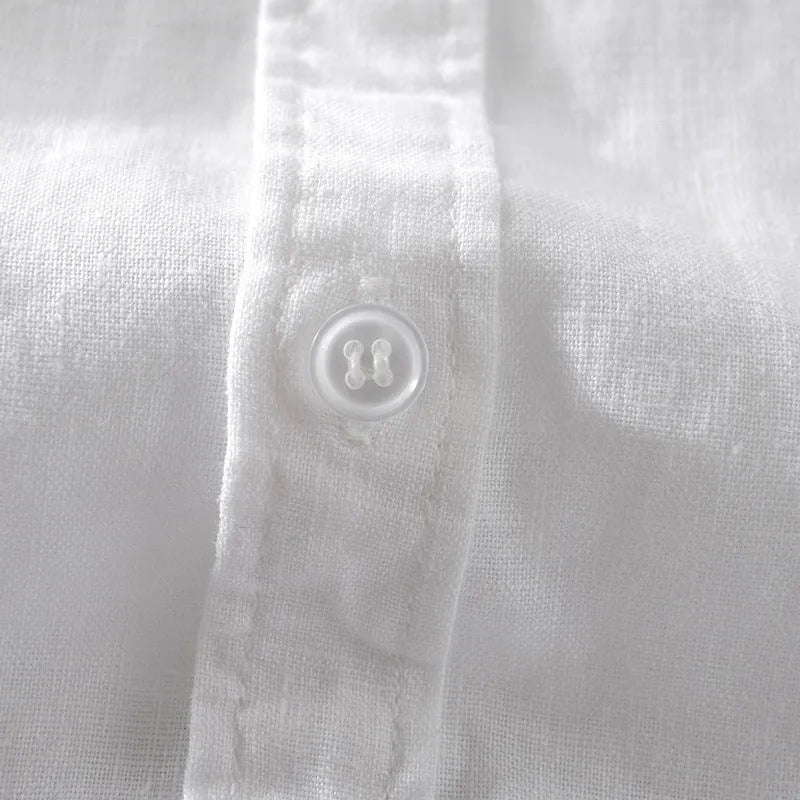 Men's solid colour short sleeve linen blend shirt in loose fit, shown in apricot colour.
