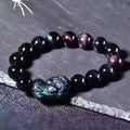 Natural ice colour eye obsidian crystal bracelet in unisex style with various bead sizes.