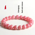 Women's geometric crystal bracelet with longevity lock design in red rhodochrosite stone