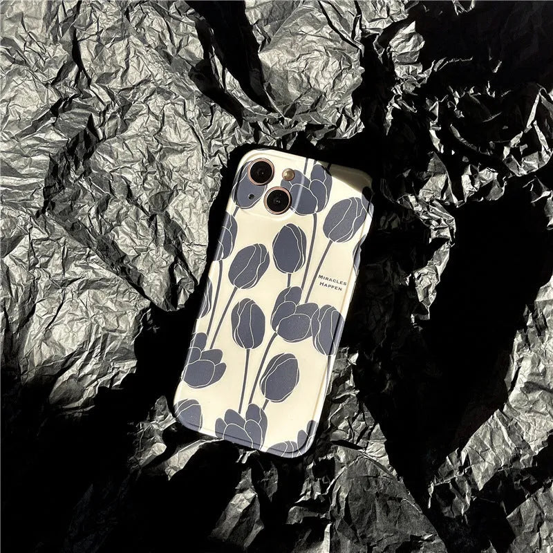 Black tulip patterned silicone phone case for Apple iPhone models on white background