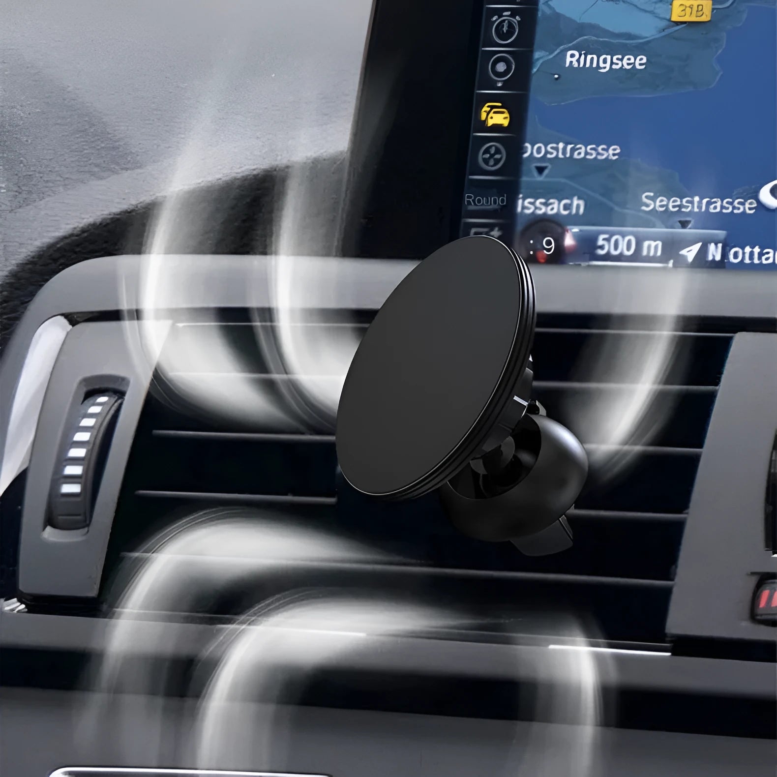Black aluminium alloy magnetic car phone holder mounted on car air vent