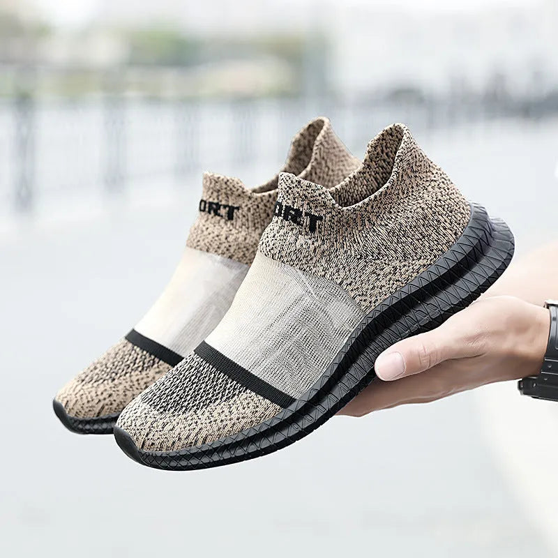 Casual beige Flyknit sports socks shoes with lace-up front and round toe on a neutral background.