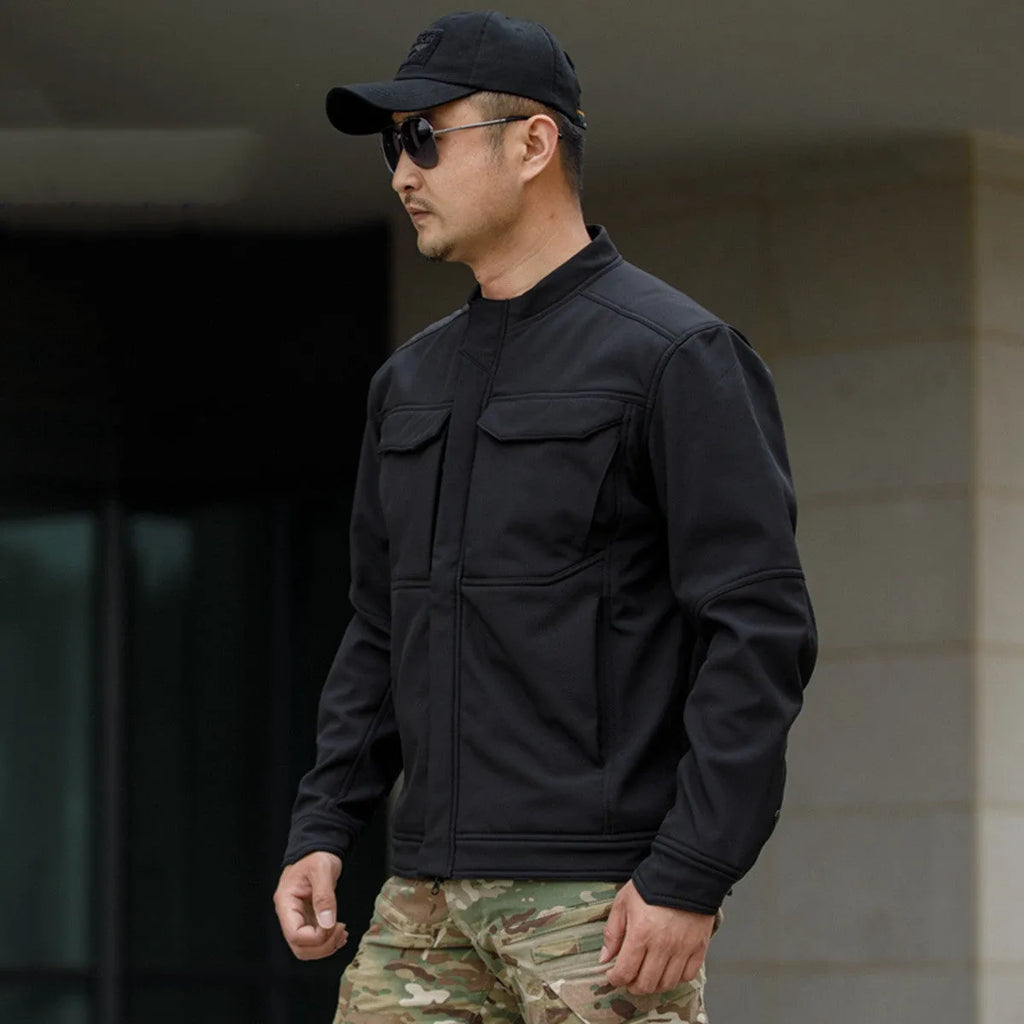 Bone Frog Peak Breaker soft shell jacket in black camouflage for outdoor mountaineering and tactical use.