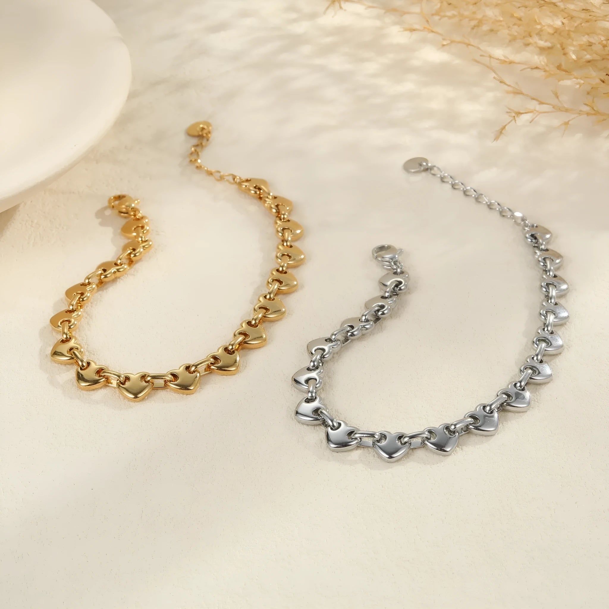 Hollowed-out stainless steel heart bracelet with electroplated non-fading finish in gold colour.