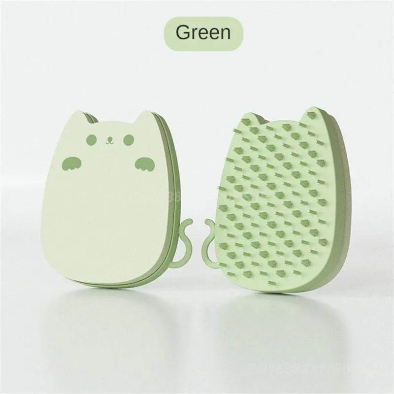 Blue sponge silicone pet comb brush with dual soft and hard bristles for cat and dog grooming.