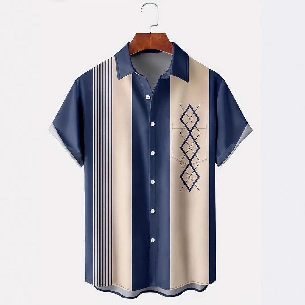 Man wearing a loose fit plaid short sleeve shirt with a lapel collar in a casual setting.