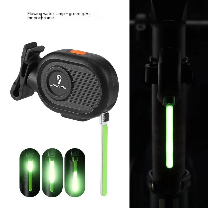 Blue waterfall effect bicycle tail light mounted on a bike seat post, showing dynamic LED light pattern.