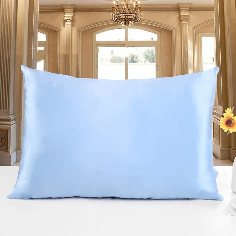 19 M double-sided silk pillowcase in apricot colour, showing envelope closure and smooth fabric texture.