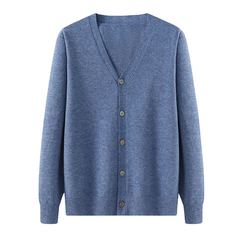 Man wearing a beige Andy velvet V-neck cardigan coat with long sleeves