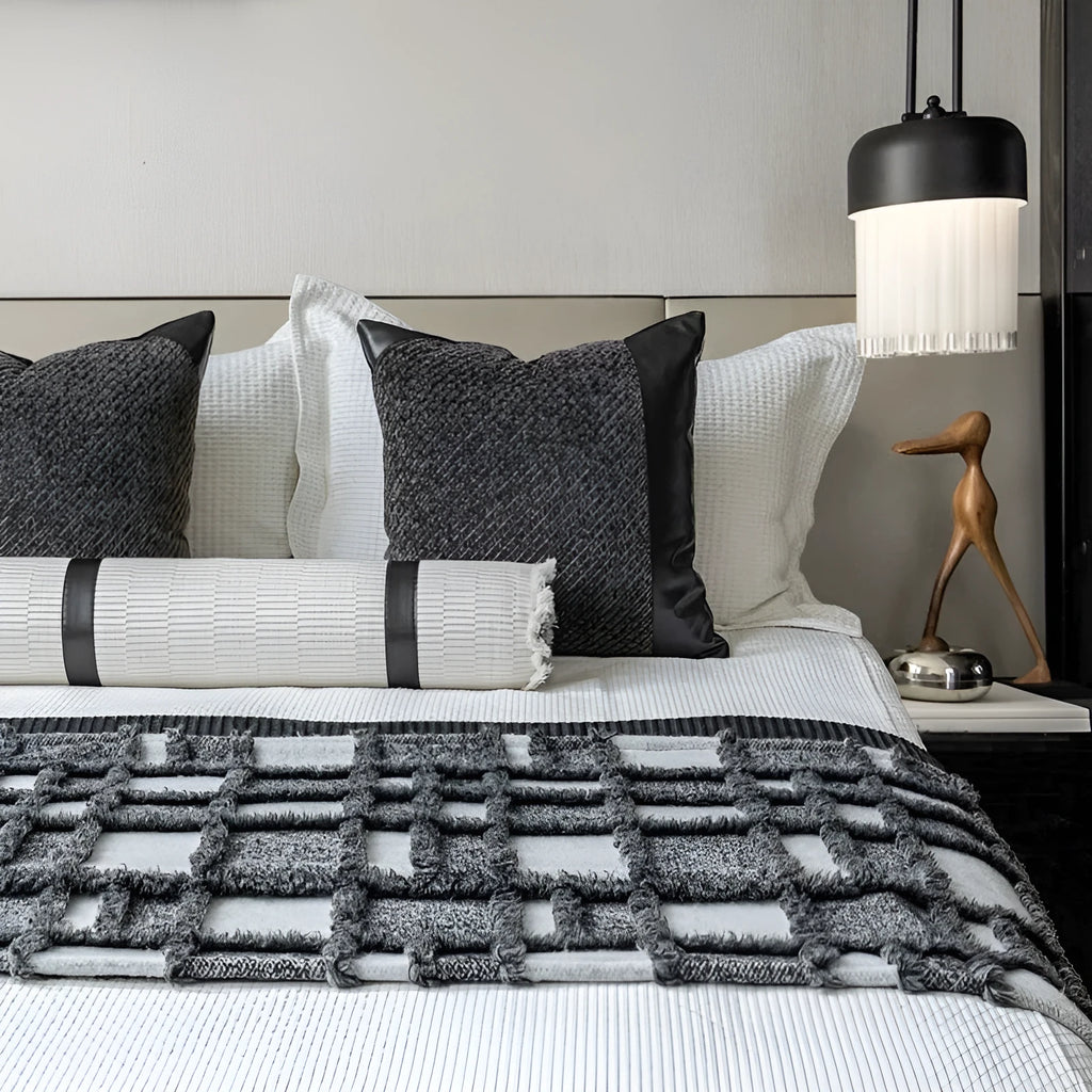 Modern minimalist grey and white plaid polyester bed runner set with pillow on a bed