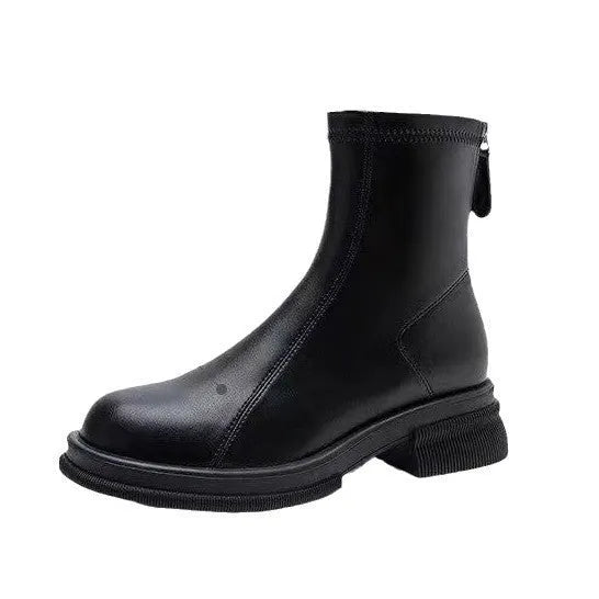 Women's black ankle boots with flat heel, back zipper, and round toe