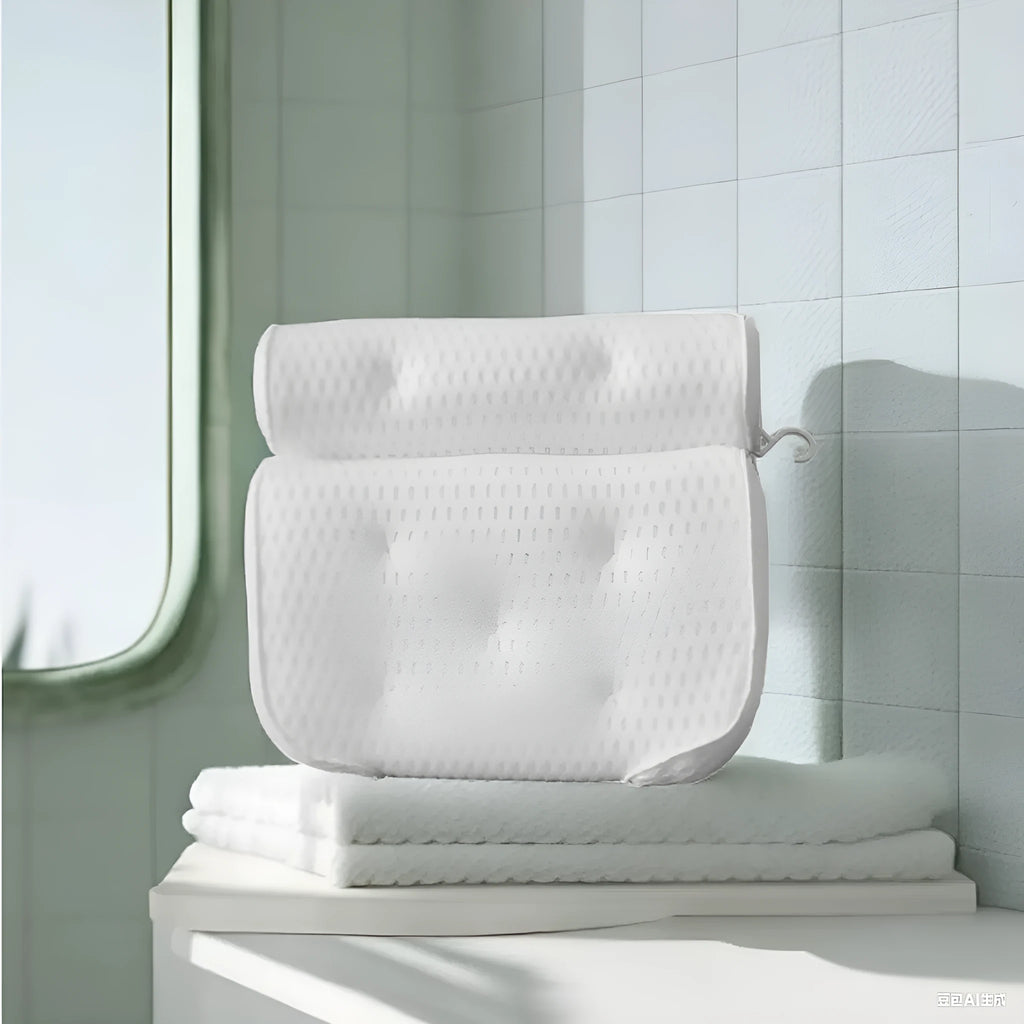 White 3D mesh bathtub pillow with multiple suction cups, shown on a bathtub.