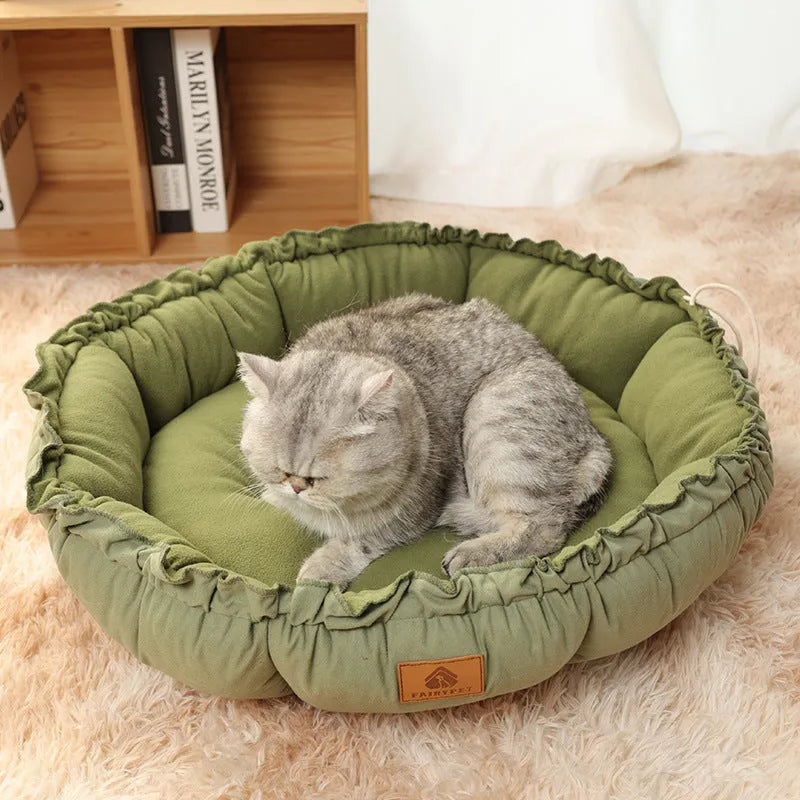 Gray and green reversible donut cat bed for indoor cats, shown in small, medium, and large sizes.