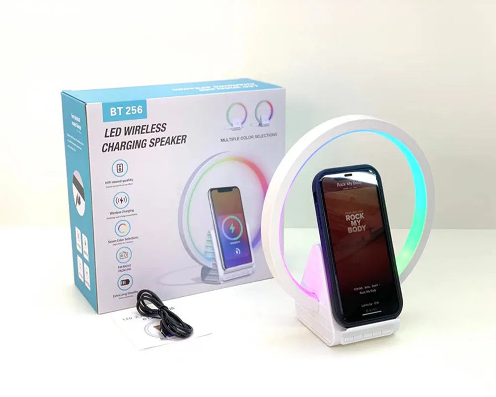 White Bluetooth speaker with wireless charging surface and ambient lighting, dimensions 225mm by 200mm