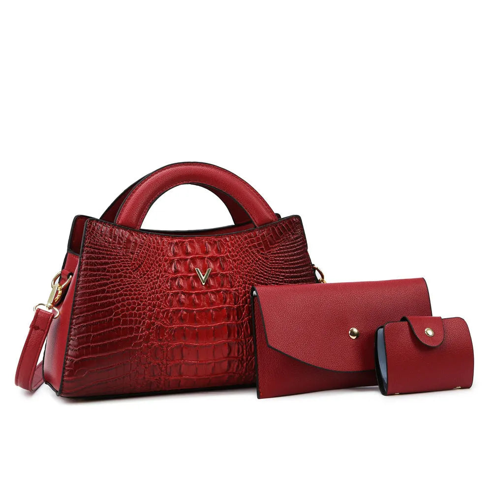 Women's black crocodile pattern crossbody handbag showing internal mobile phone and document compartments