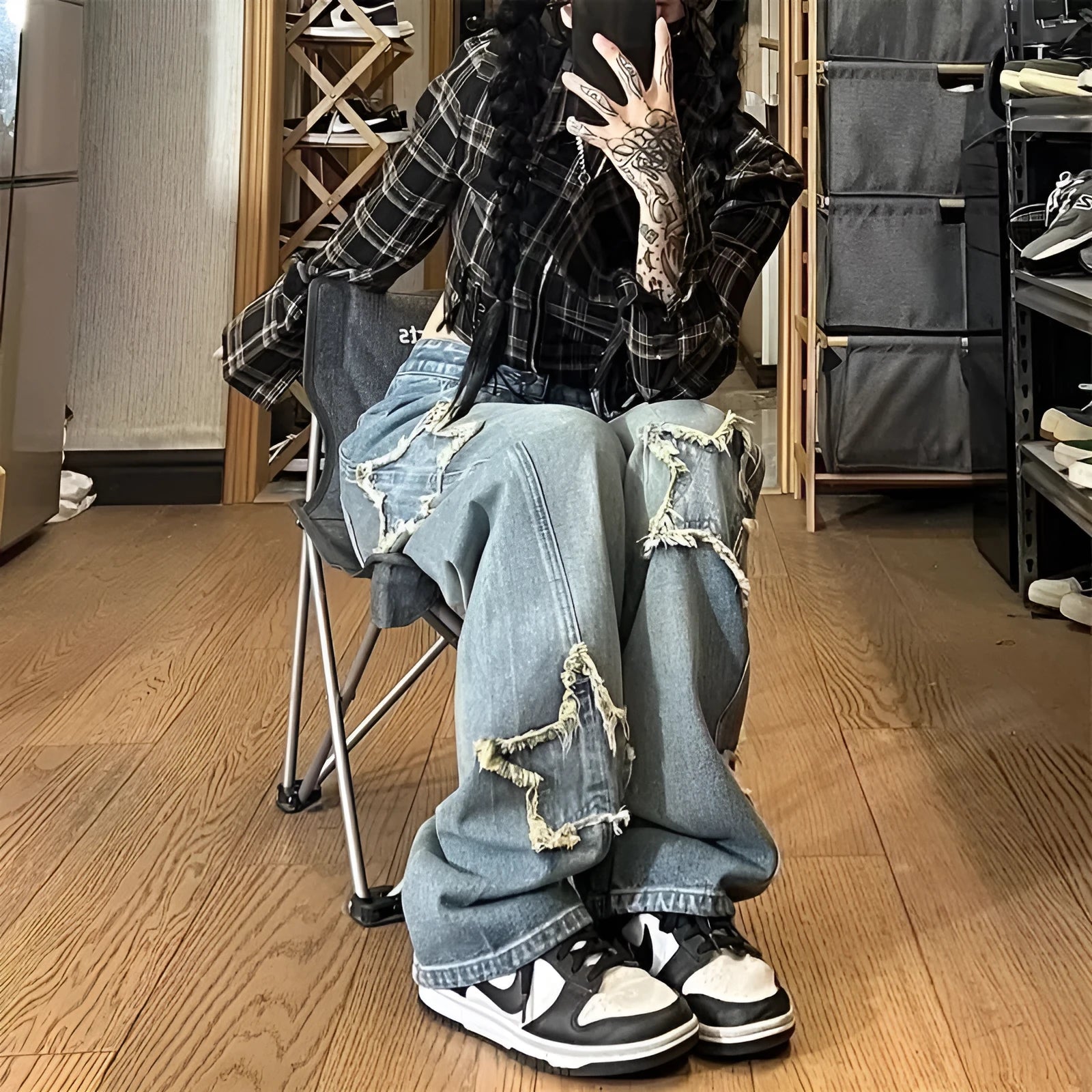 Blue cotton denim wide-leg high waist pants laid flat showing straight leg cut