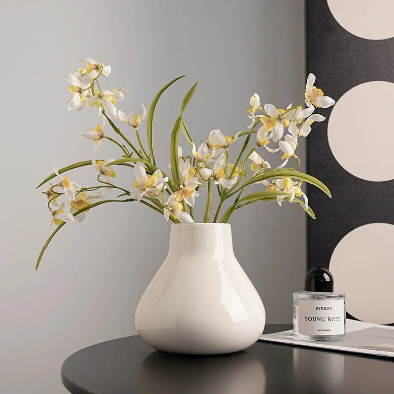 Ceramic round belly French high sense decorative vase in black or white with coloured glaze finish and floral ornaments